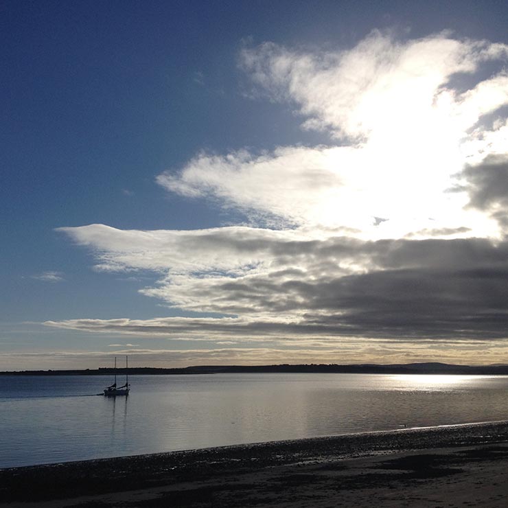 Calm seas with Fort George across the water